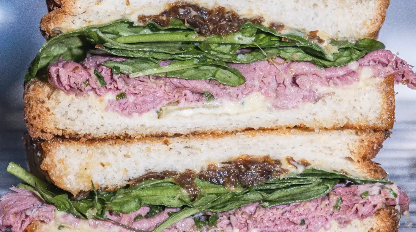 The roast beef sandwich, cut in half